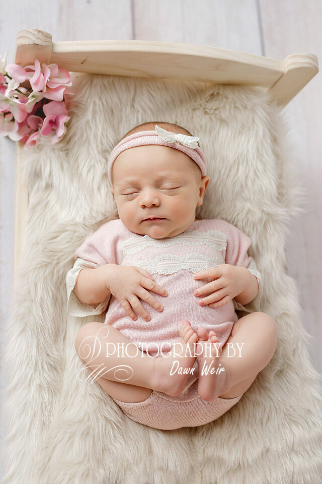 Baby sleeping peacefully after baby sleep consultant services from Leah Tully